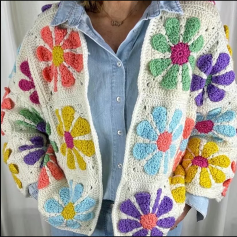 Flower power crochet cardigan with multicoloured daisy motifs